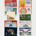 All ten Tikat postcards laid out in two columns